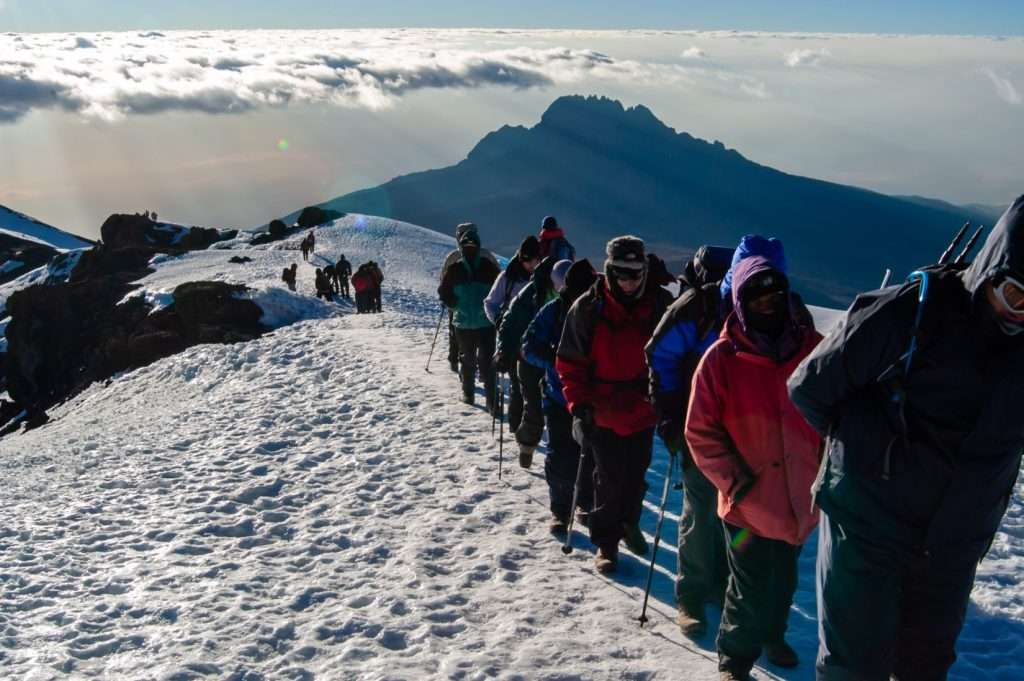 Tourists Climbing the Mount Kilimanjaro
