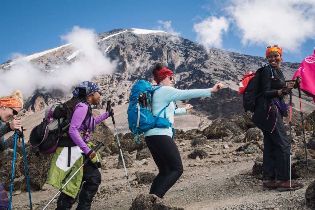 Tourists hiking through the majestic Mount Kilimanjaro
