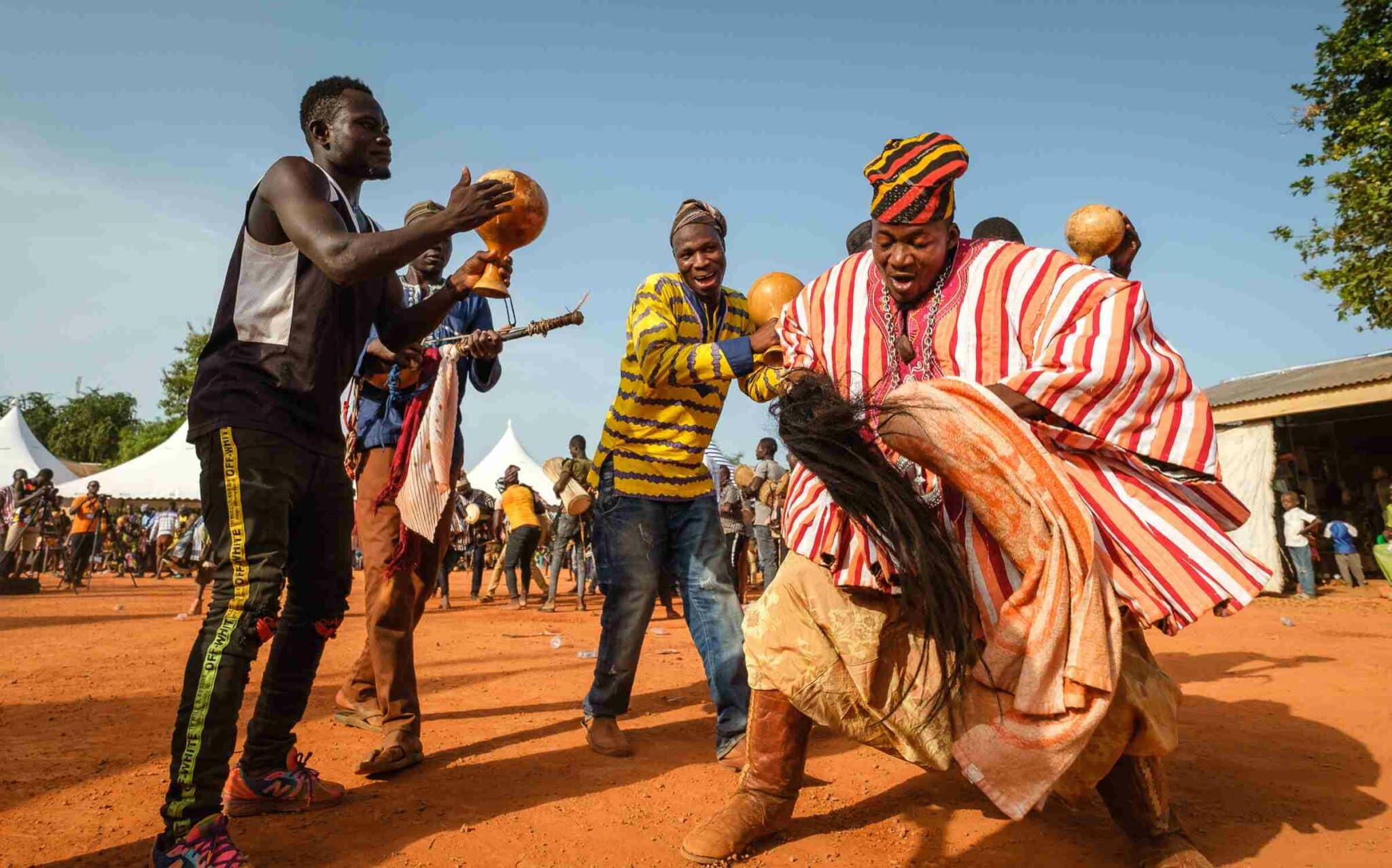 Locals dancing celebrating the Damba festival 