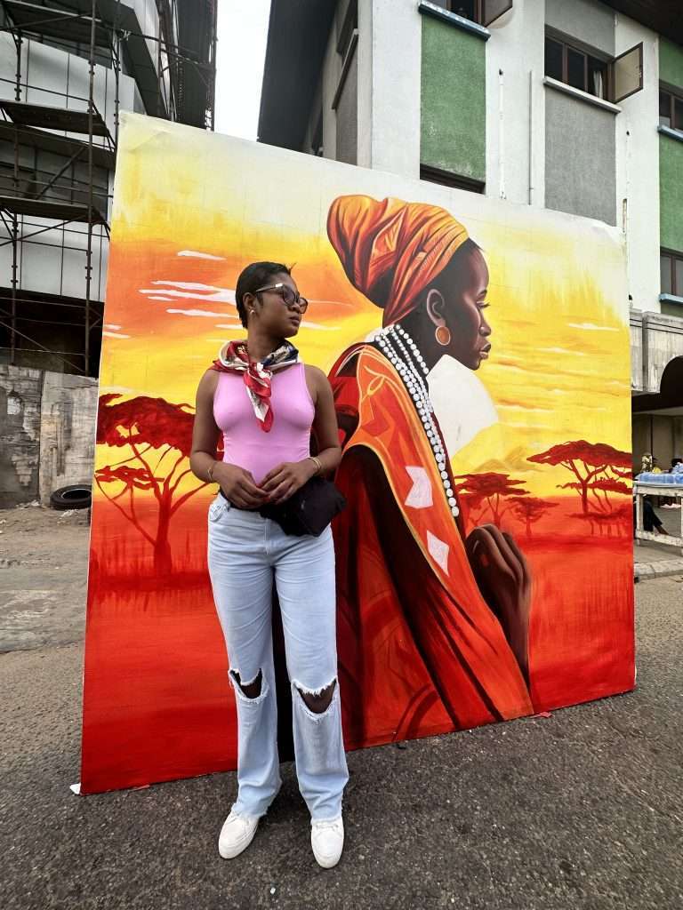 Admiring colorful arts on the streets of Accra