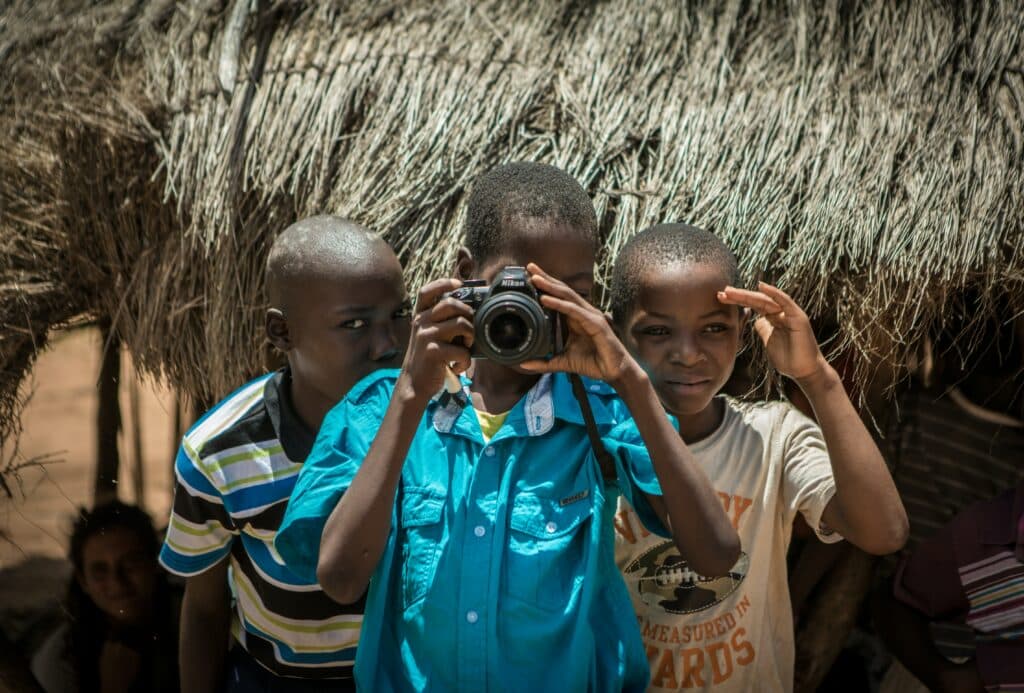 Children playing with camera 