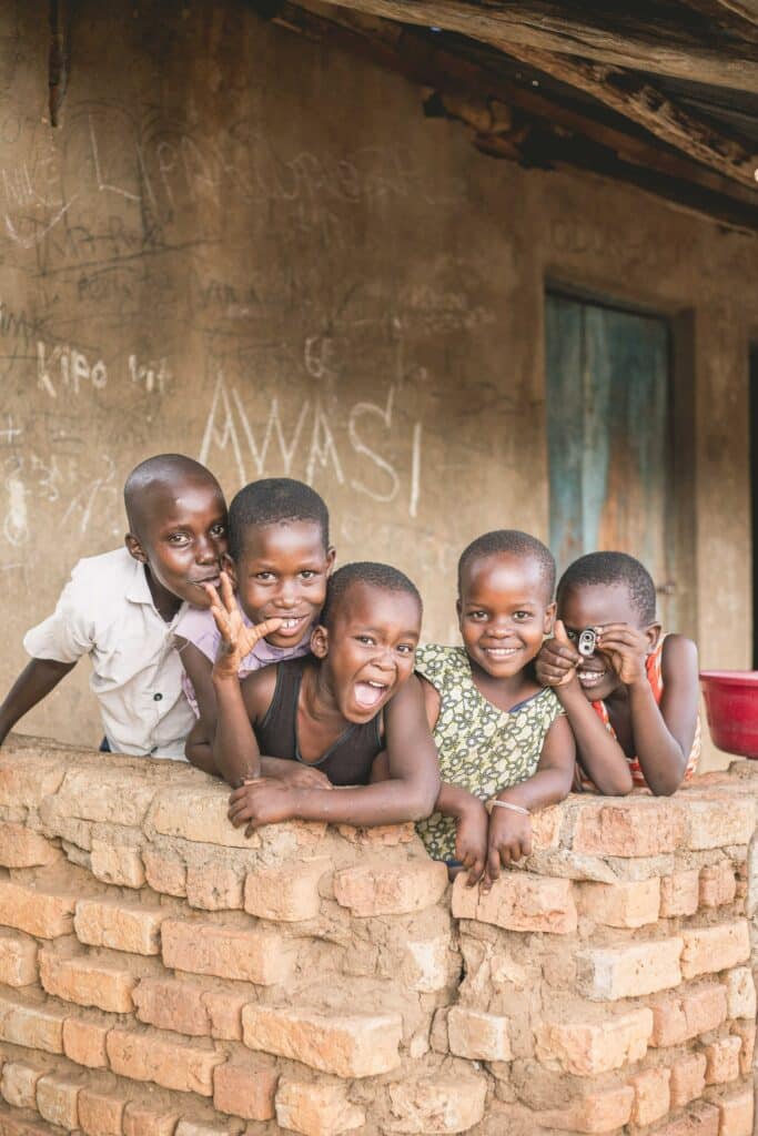 Children posing with a smile for the camera